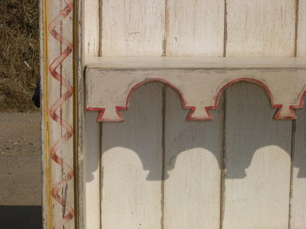 Antique painted library cabinet with scalloped shelf facings, pine and poplar