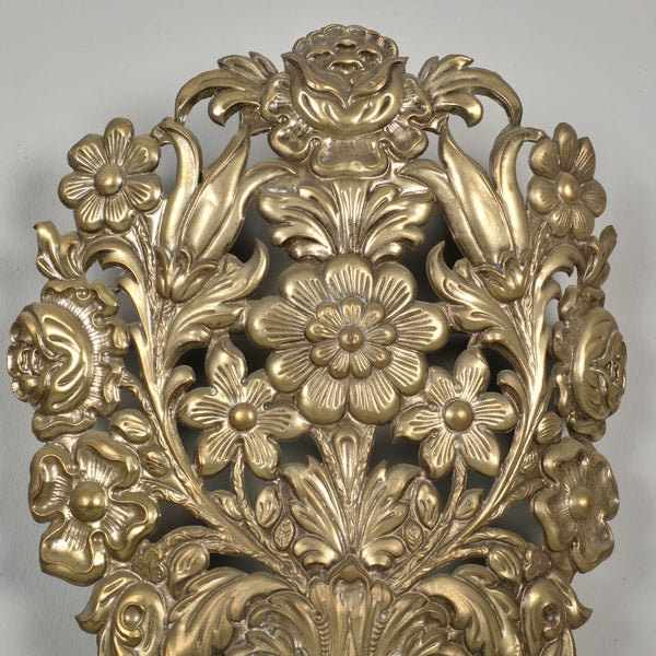 Antique pair of pierced metal repoussè sconces