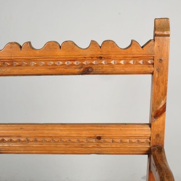 Antique carved Pyrenees arm chair, pine