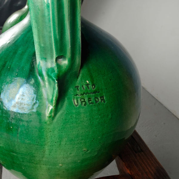 Antique three hole water jug stand with glazed jugs