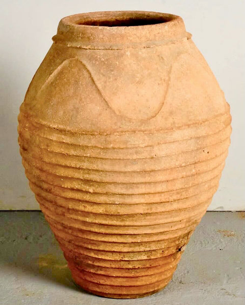 Large antique terracotta water jar with “waves”