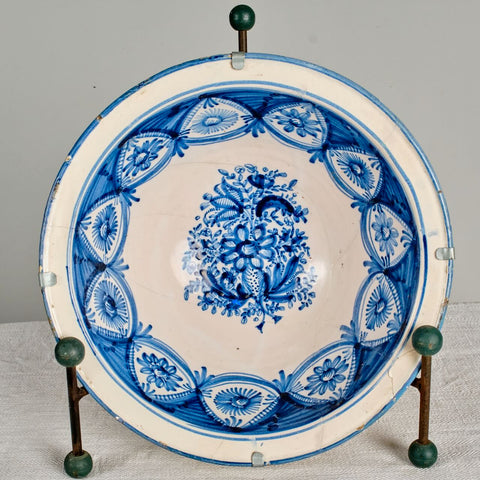 Antique painted and glazed blue and white “Manises” wash basin with floral motifs