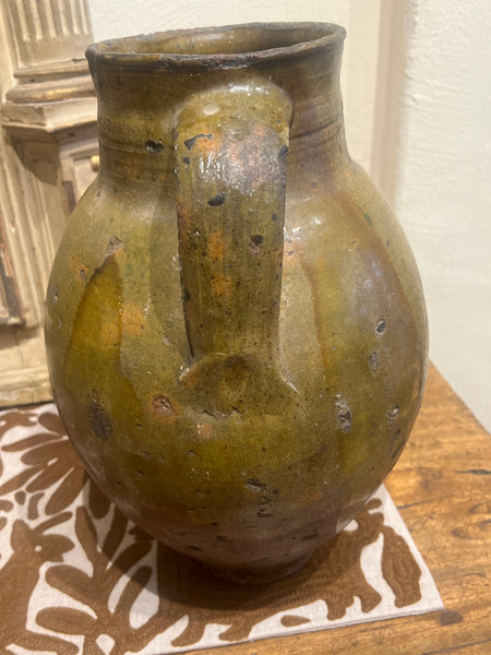 Single-handle, semi-glazed olive green oil pitcher