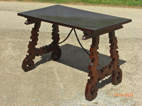 Antique folding scalloped-leg campaign table with iron stretchers, walnut