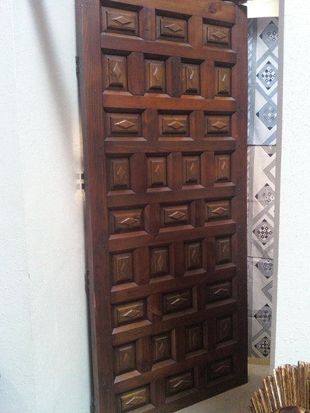 Single panel double-faced raised panel door in pine