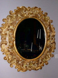 Reproduction hand-carved and gilt oval