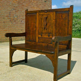 Antique high-back Pyrenees bench with drop-flap table, pine