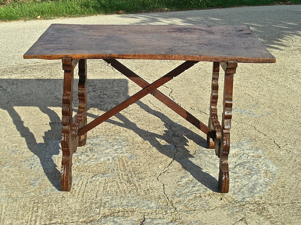 Antique scalloped lyre-leg library table with wooden stretchers, walnut
