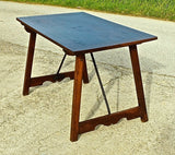 Trestle-leg campaign table with iron stretchers in walnut