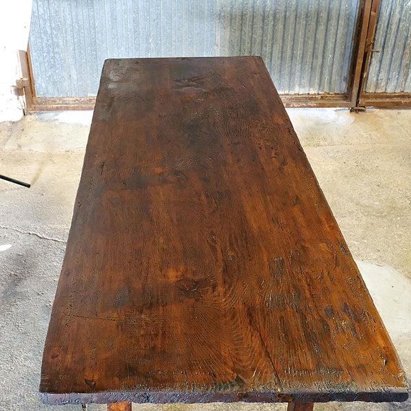 Antique carved two-drawer mixed wood scalloped skirt library table