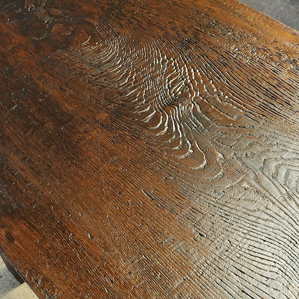 Antique carved two-drawer mixed wood scalloped skirt library table