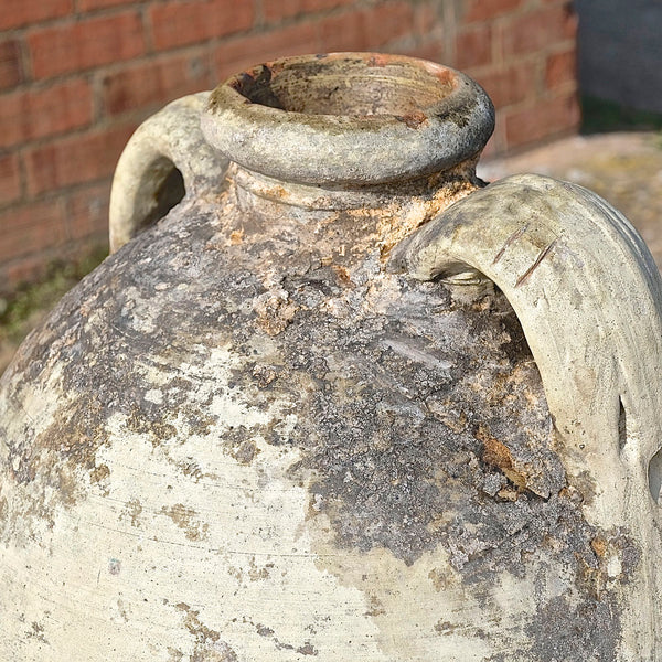 Antique large, two-handle olive oil jar with iron base