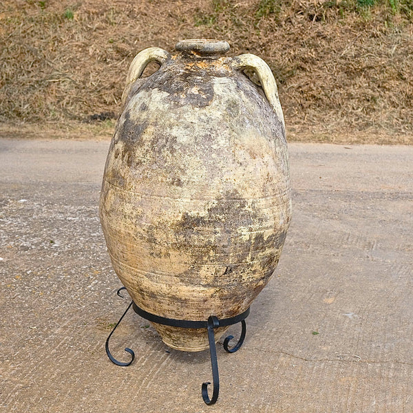 Antique large, two-handle olive oil jar with iron base
