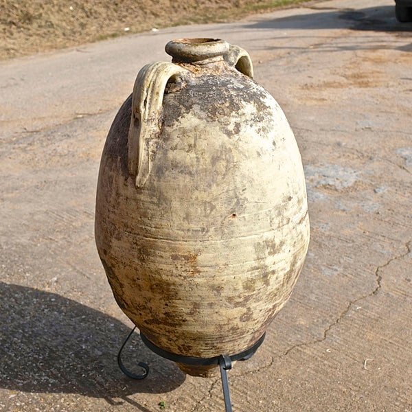Antique large, two-handle olive oil jar with iron base