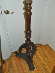 Antique tripod floor candlestick with gilt metal bobeche