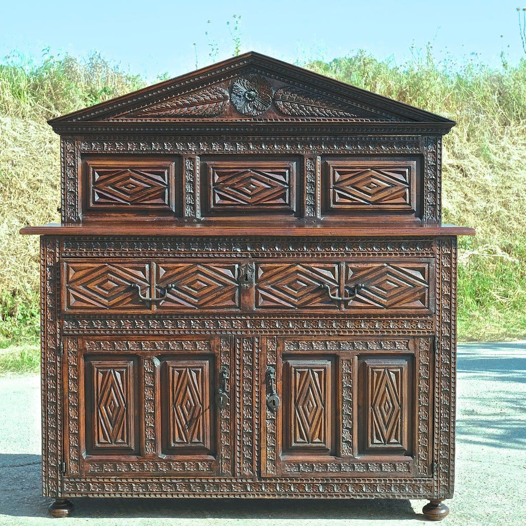 Antique heavily carved one-drawer, two-door sacristy chest, walnut, elm, oak, holm oak