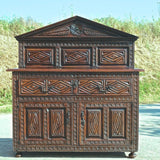 Antique heavily carved one-drawer, two-door sacristy chest, walnut, elm, oak, holm oak