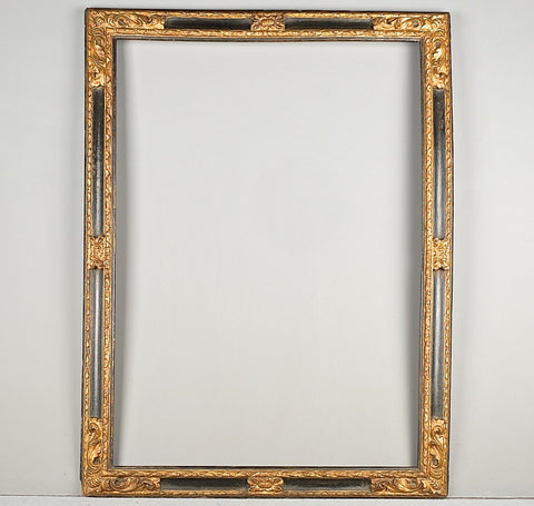 Antique carved, painted and gilt mirror frame