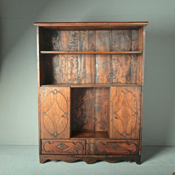 Carved two-door, two-drawer antique apothecary cabinet, cherry