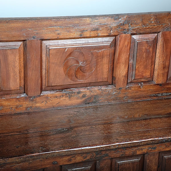 Large antique mixed wood choir bench, oak, elm and walnut