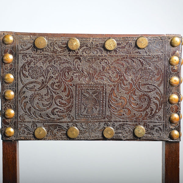 Pair of antique tooled leather Spanish colonial chairs, walnut
