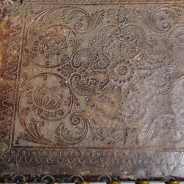 Pair of antique tooled leather Spanish colonial chairs, walnut