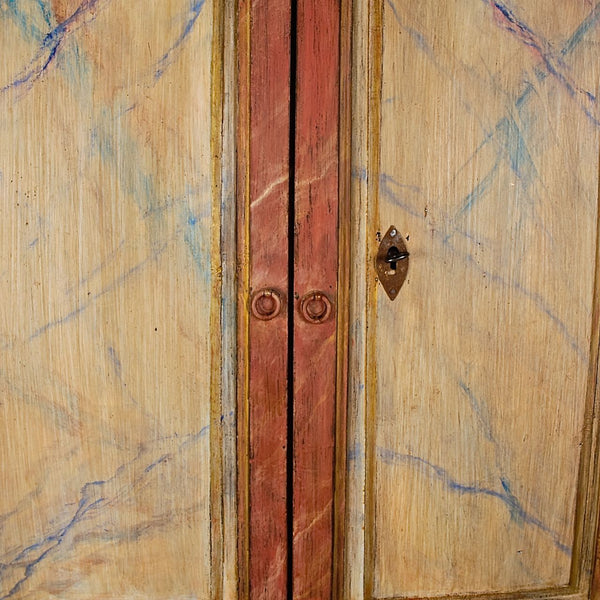 Painted antique faux marble four-door cabinet