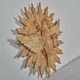 Antique carved and painted wood sculpture of the Holy Spirit with rays of God