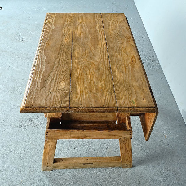 Antique scalloped skirt trestle leg table with drawer