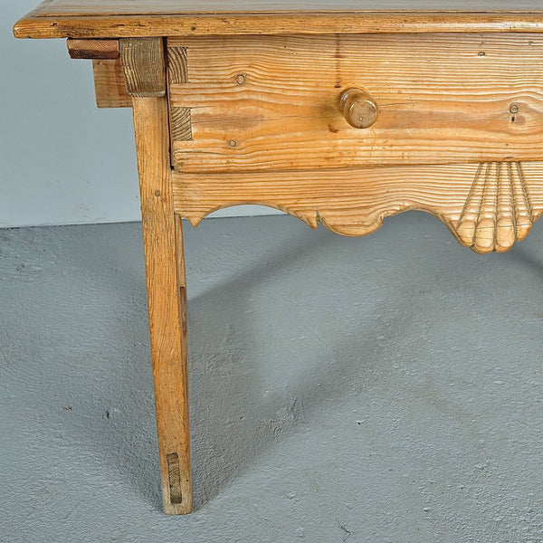 Antique scalloped skirt trestle leg table with drawer