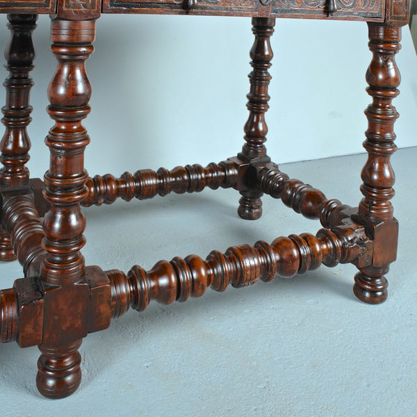Antique turned six leg, two-drawer inlaid library table