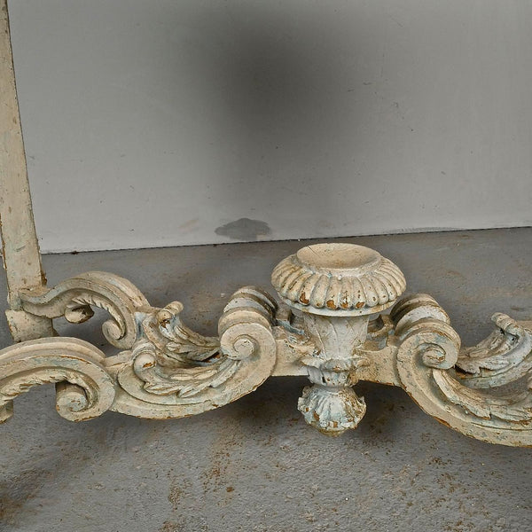 Antique carved and painted oval “tortoise” table, pine