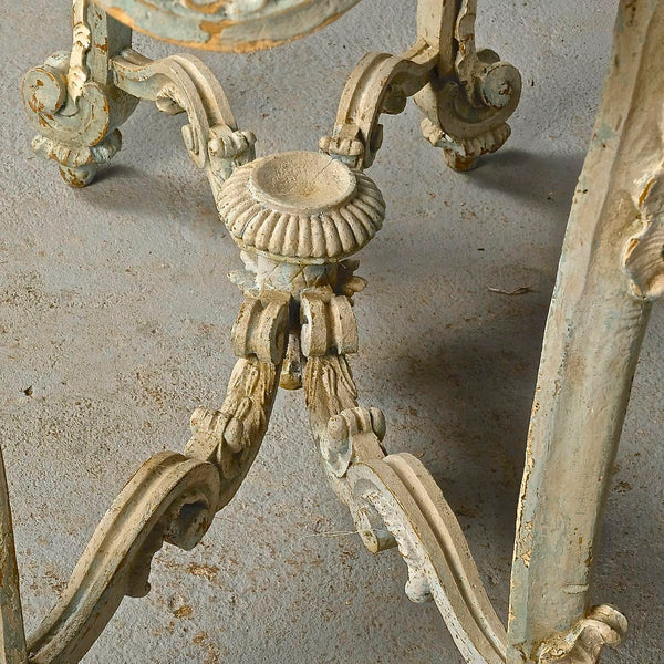 Antique carved and painted oval “tortoise” table, pine