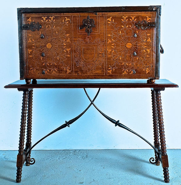 Antique inlaid vargueño on lentil leg table with iron stretchers