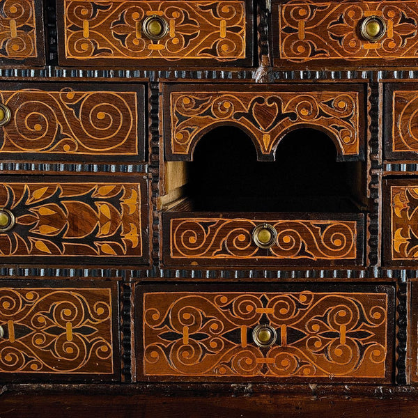 Antique inlaid vargueño on lentil leg table with iron stretchers