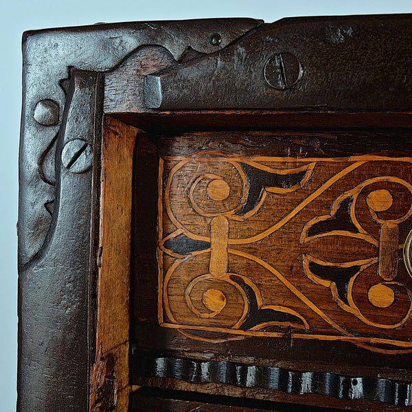 Antique inlaid vargueño on lentil leg table with iron stretchers
