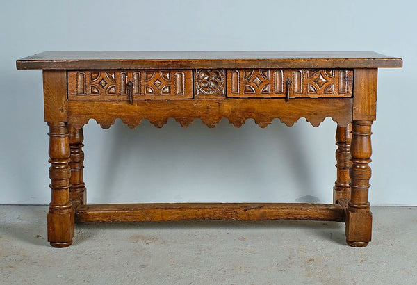 Antique carved two-drawer scalloped skirt library table, walnut