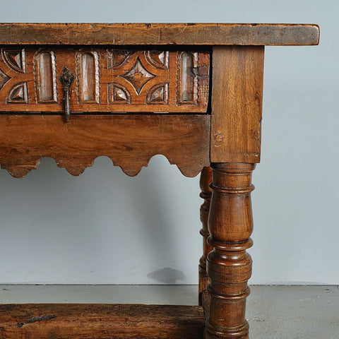 Antique carved two-drawer scalloped skirt library table, walnut