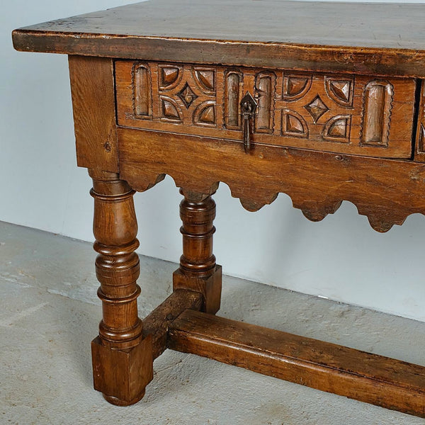 Antique carved two-drawer scalloped skirt library table, walnut