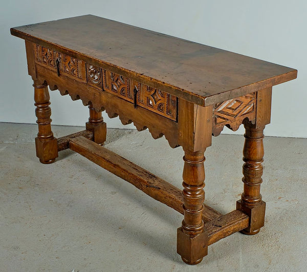 Antique carved two-drawer scalloped skirt library table, walnut