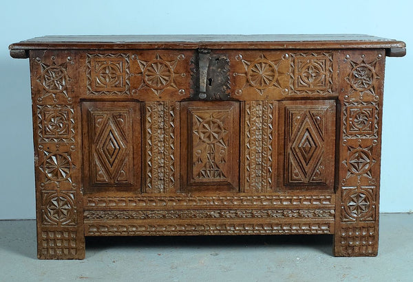 Antique carved Basque arms chest, oak