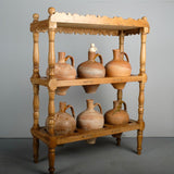 Antique two-tier, six hole water jug stand with original clay jugs, pine