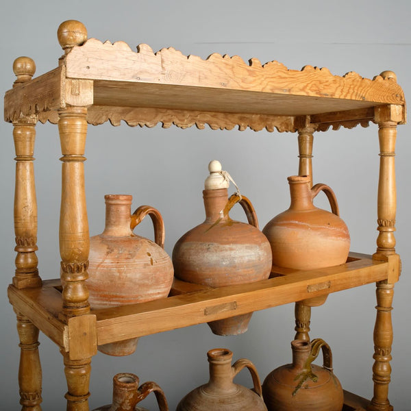 Antique two-tier, six hole water jug stand with original clay jugs, pine