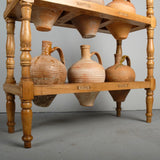 Antique two-tier, six hole water jug stand with original clay jugs, pine