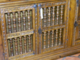 Carved four-door reproduction Spanish colonial sideboard / credenza, cachimbo hardwood