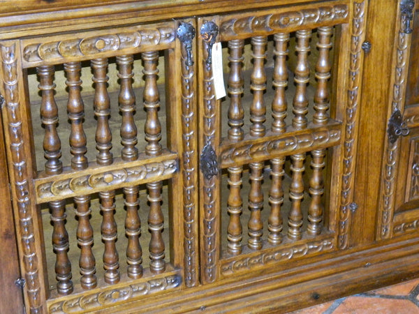 Carved four-door reproduction Spanish colonial sideboard / credenza, cachimbo hardwood