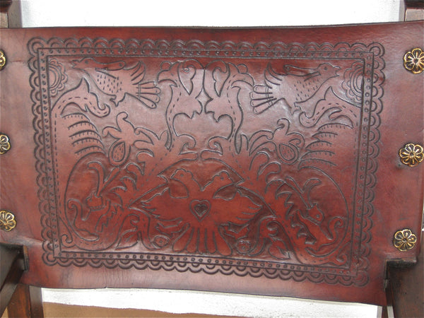 Reproduction carved and tooled leather friar's chair, cachimbo hardwood
