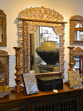 Reproduction carved, pierced and silvered Spanish colonial mirror frame, cachimbo hardwood