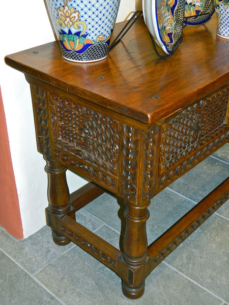 Carved two-drawer reproduction Spanish colonial library table