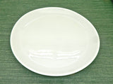 Large hand-thrown white porcelain steak platter